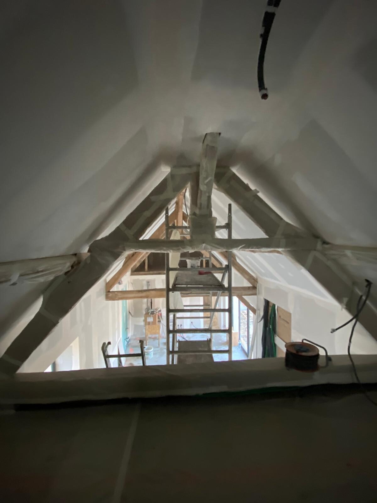 Combles avec charpente traditionnelle apparente